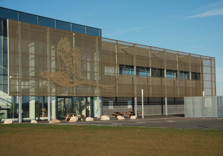 Perforated Image Design in Corten Steel Facade Cladding
